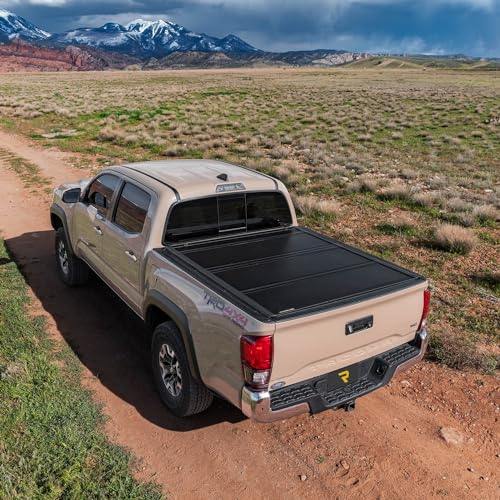 UnderCover Ultra Flex Hard Folding Truck Bed Tonneau Cover | UX32004 | Fits 2002 - 2018, 2019 - 2020 Classic Dodge Ram 1500, 2003-20 2500/3500, w/out RamBox 6' 4" Bed (76.3")