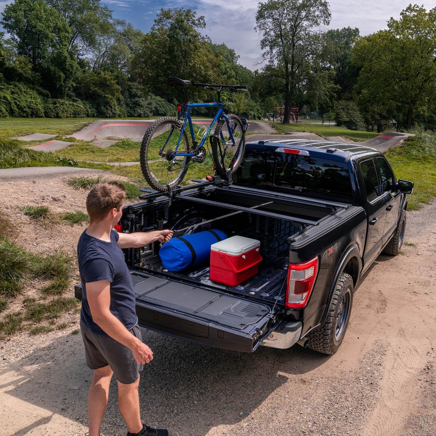 RealTruck Roll-N-Lock M-Series XT Retractable Truck Bed Tonneau Cover | 531M-XT | Fits 2016-2023 Toyota Tacoma (w/o OE track system or Trail Edition) 6' 2" Bed (73.7")